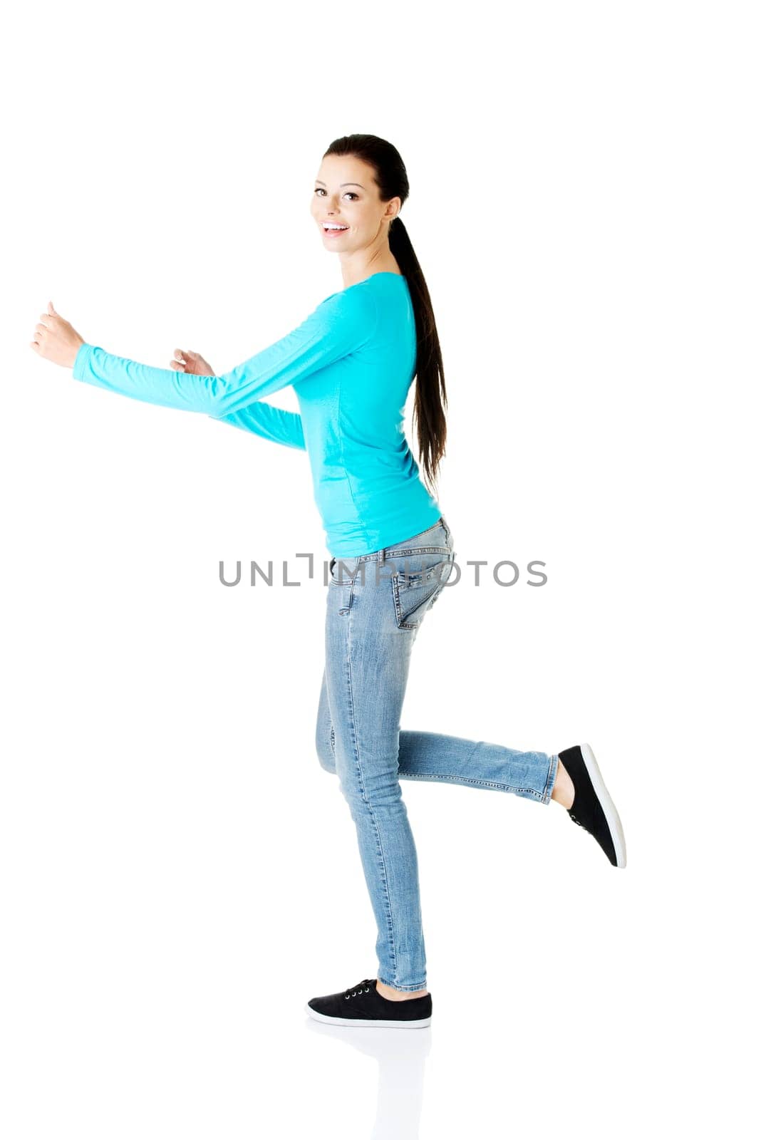 Happy student girl running, isoalated on white background