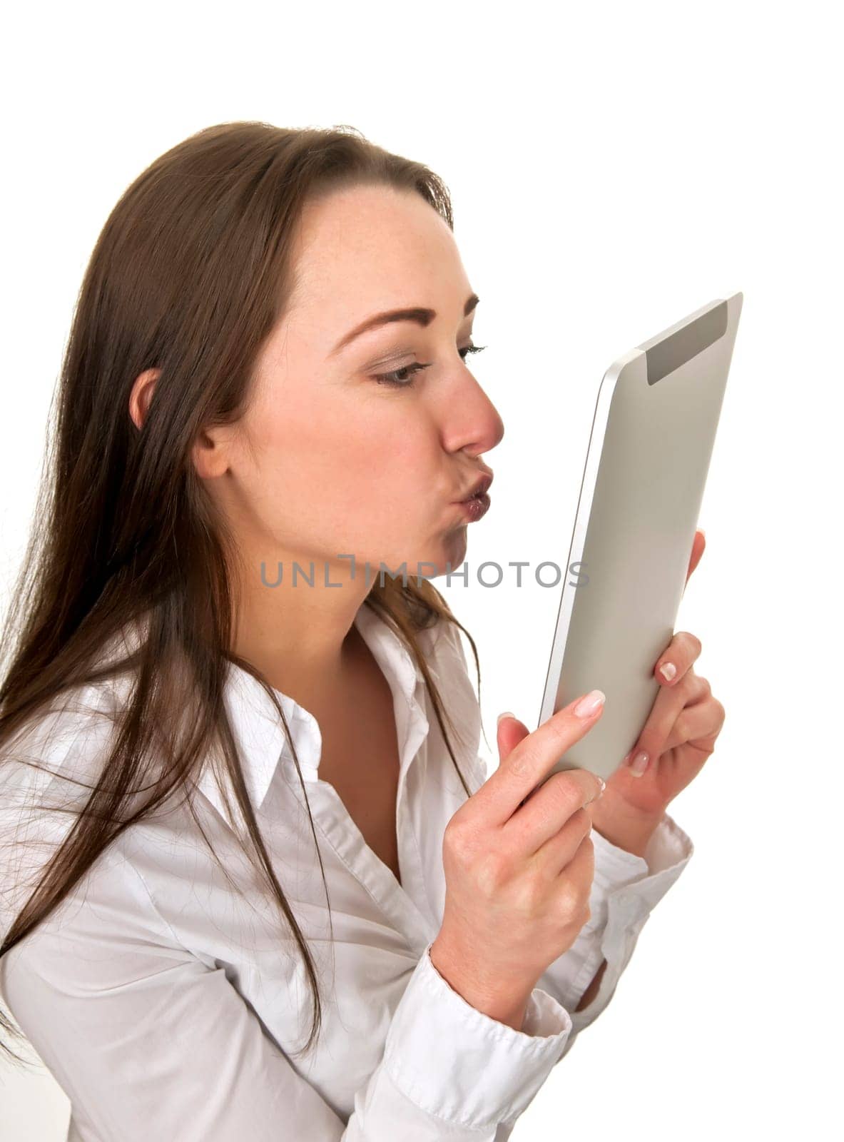 Businesswoman kissing tablet pc