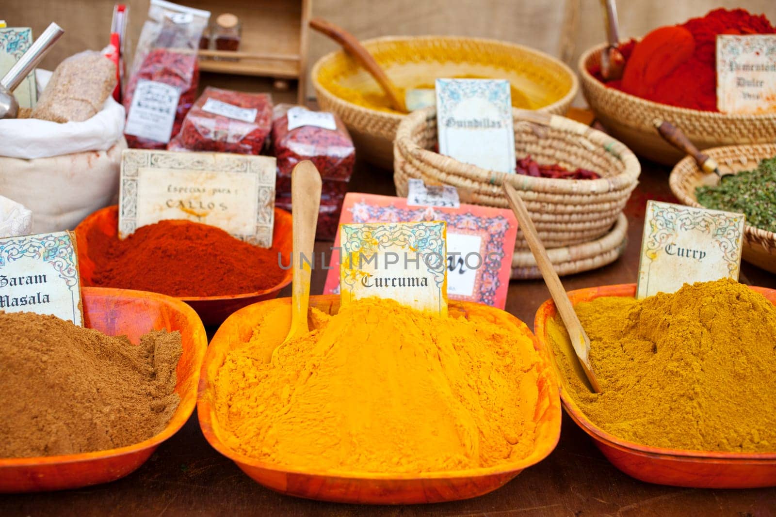 Differents Spices on wooden bowls, street market