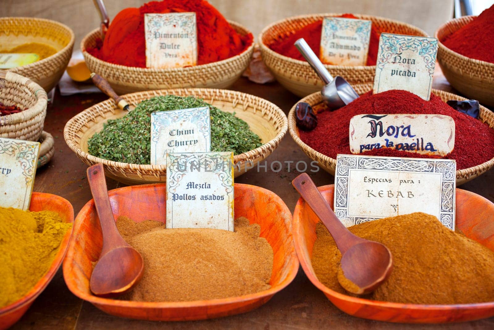 Differents Spices on wooden bowls, street market