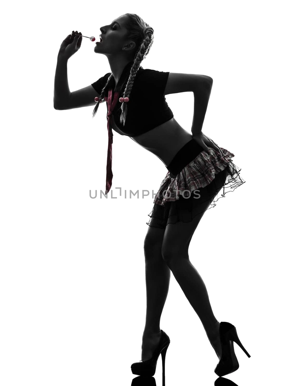 one caucasian sexy woman school student costume  portrait  in silhouette studio isolated on white background