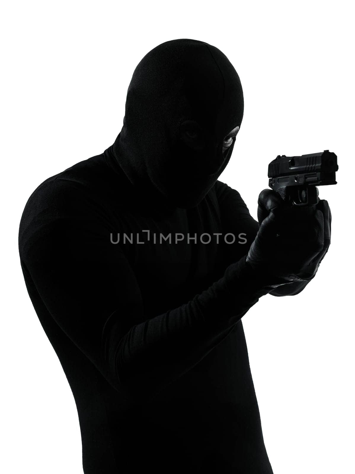 thief criminal terrorist holding gun portrait in silhouette studio isolated on white background