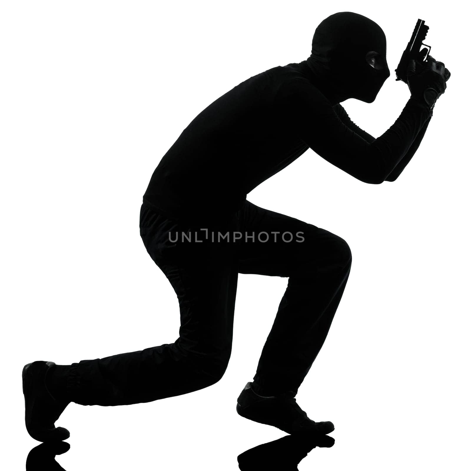 thief criminal terrorist in silhouette studio isolated on white background