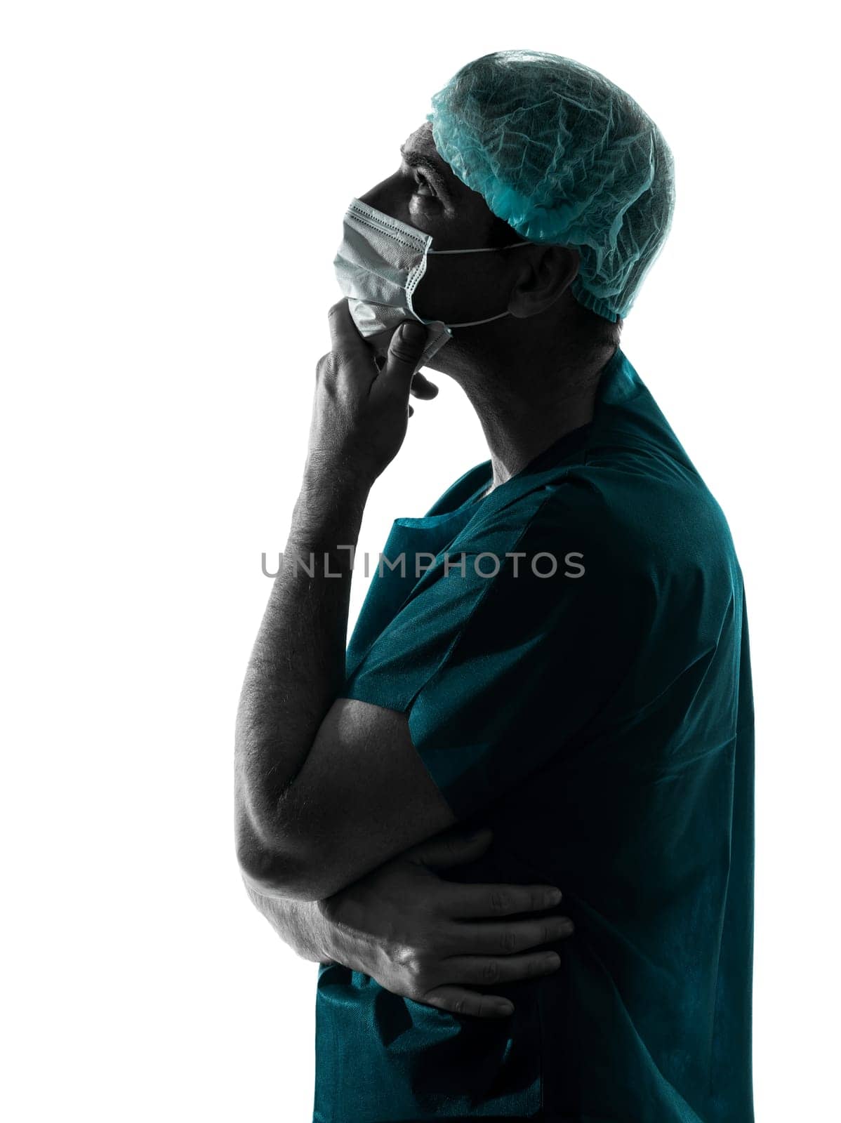 one caucasian doctor surgeon man portrait with face mask medical worker silhouette isolated on white background