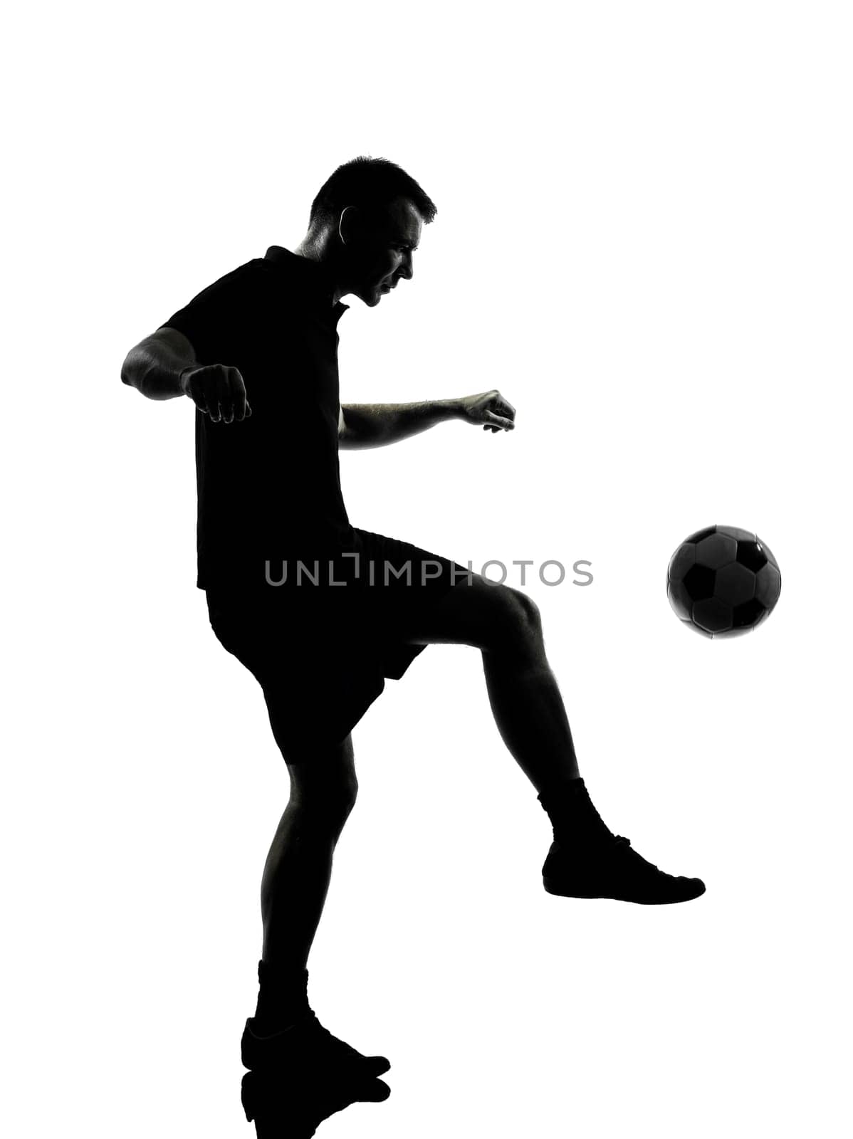 one man soccer player in studio silhouette isolated on white background