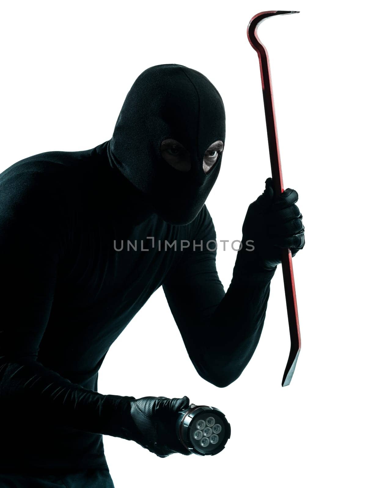 thief criminal burglar portrait masked  in silhouette studio isolated on white background