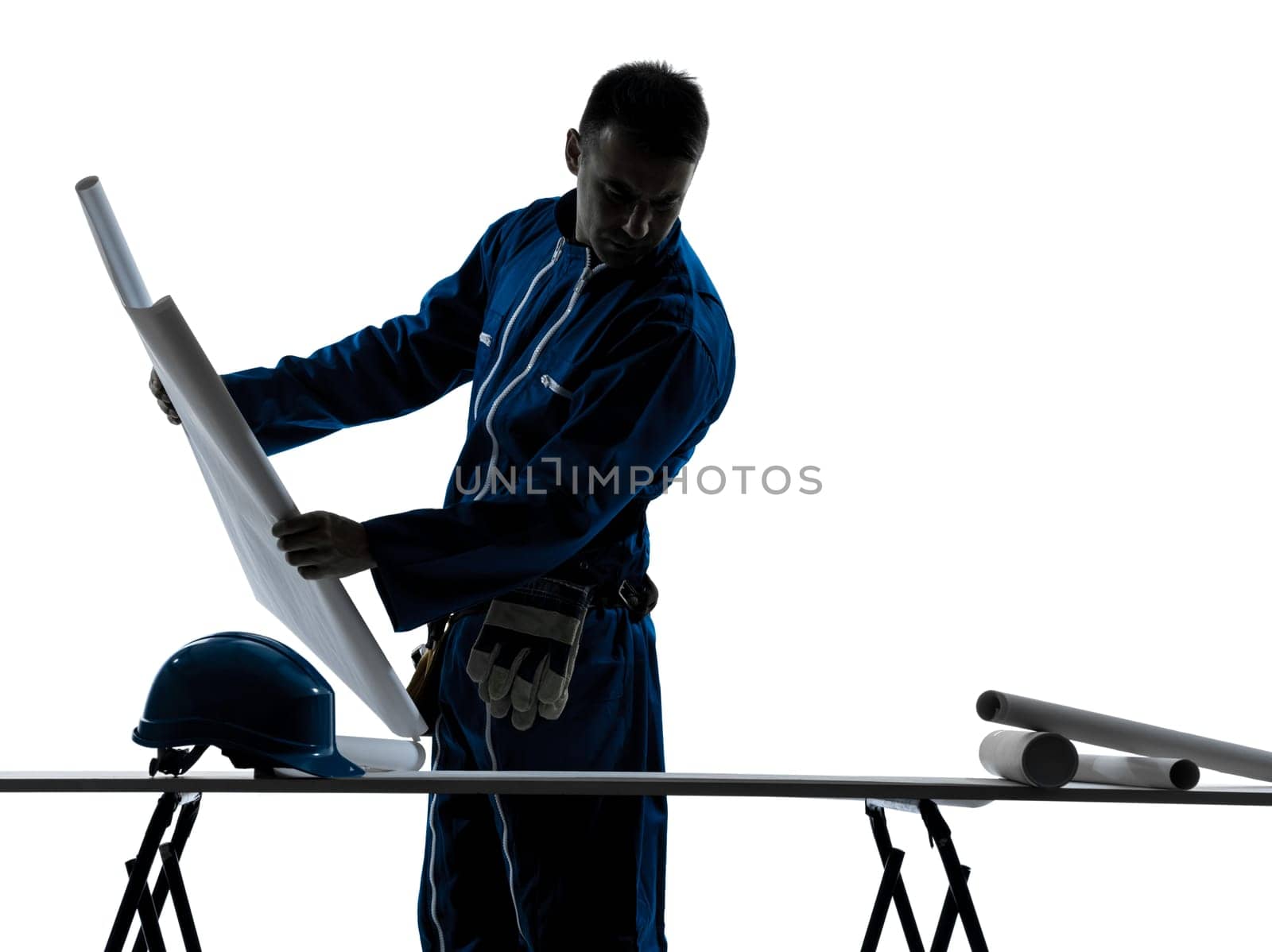 one caucasian man construction  Architect working plans silhouette in studio on white background