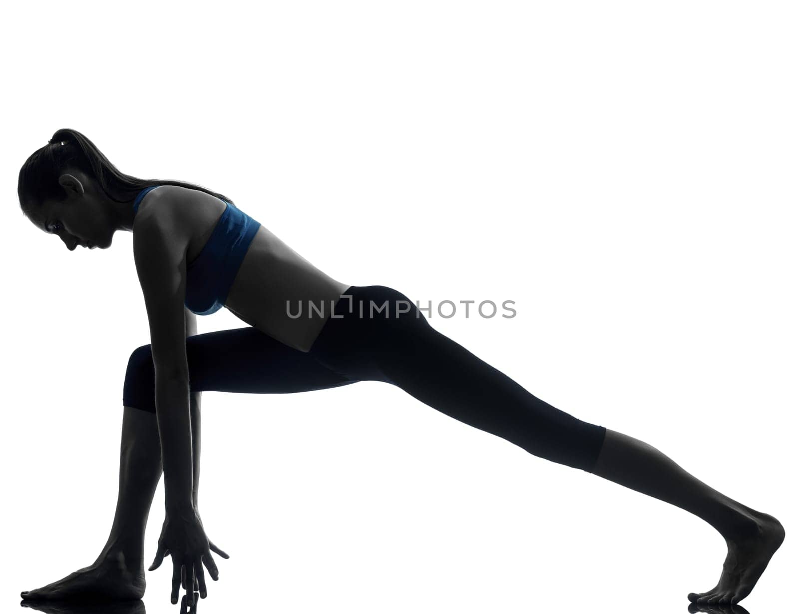 one caucasian woman exercising yoga in silhouette studio isolated on white background