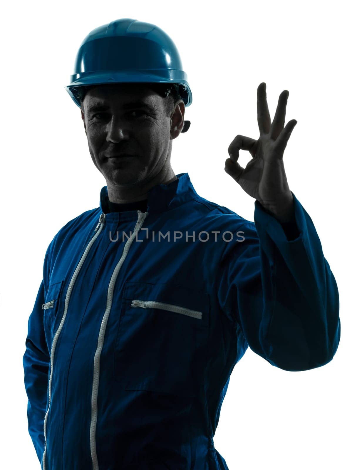 one caucasian man construction worker smiling silhouette portrait okay gesture in studio on white background