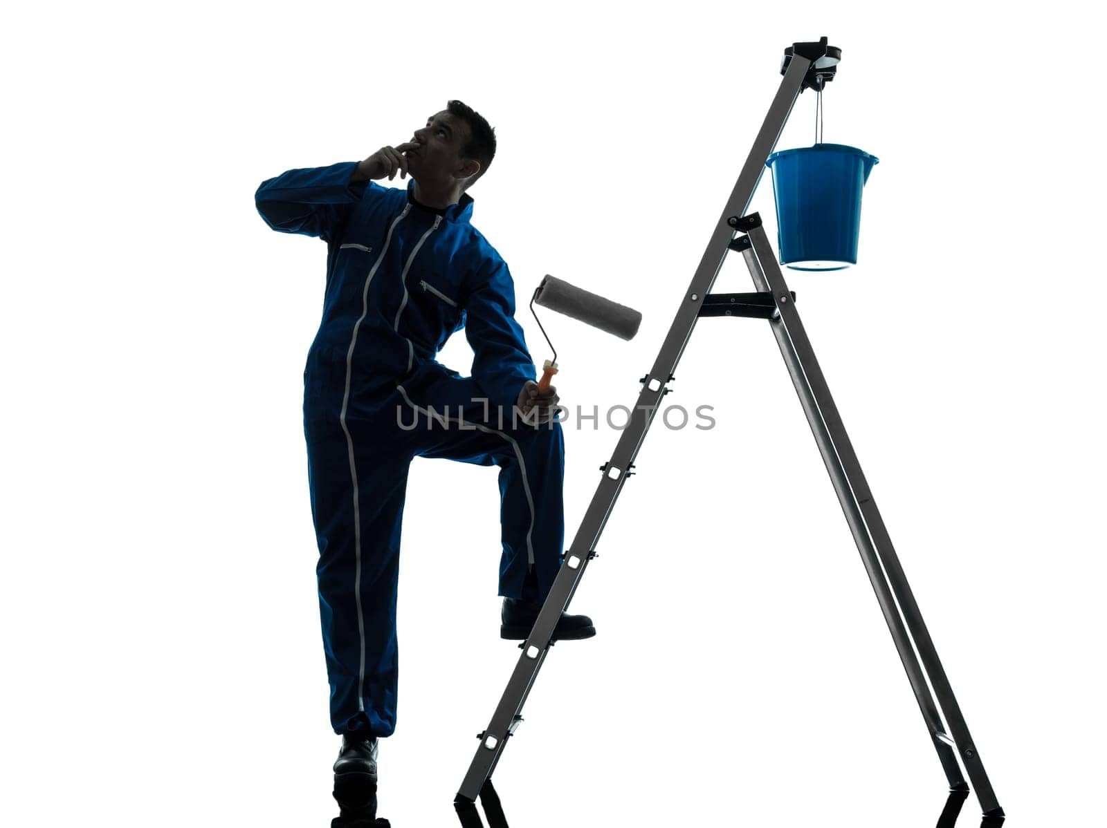 one caucasian man house painter worker silhouette in studio on white background