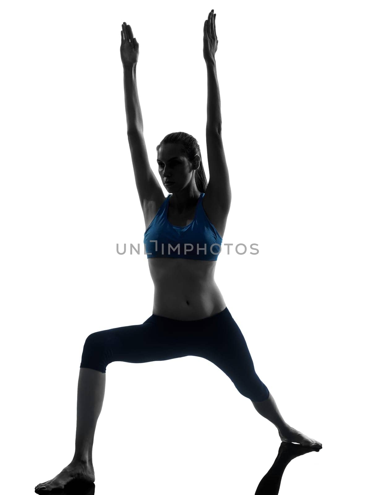 one caucasian woman exercising yoga in silhouette studio isolated on white background