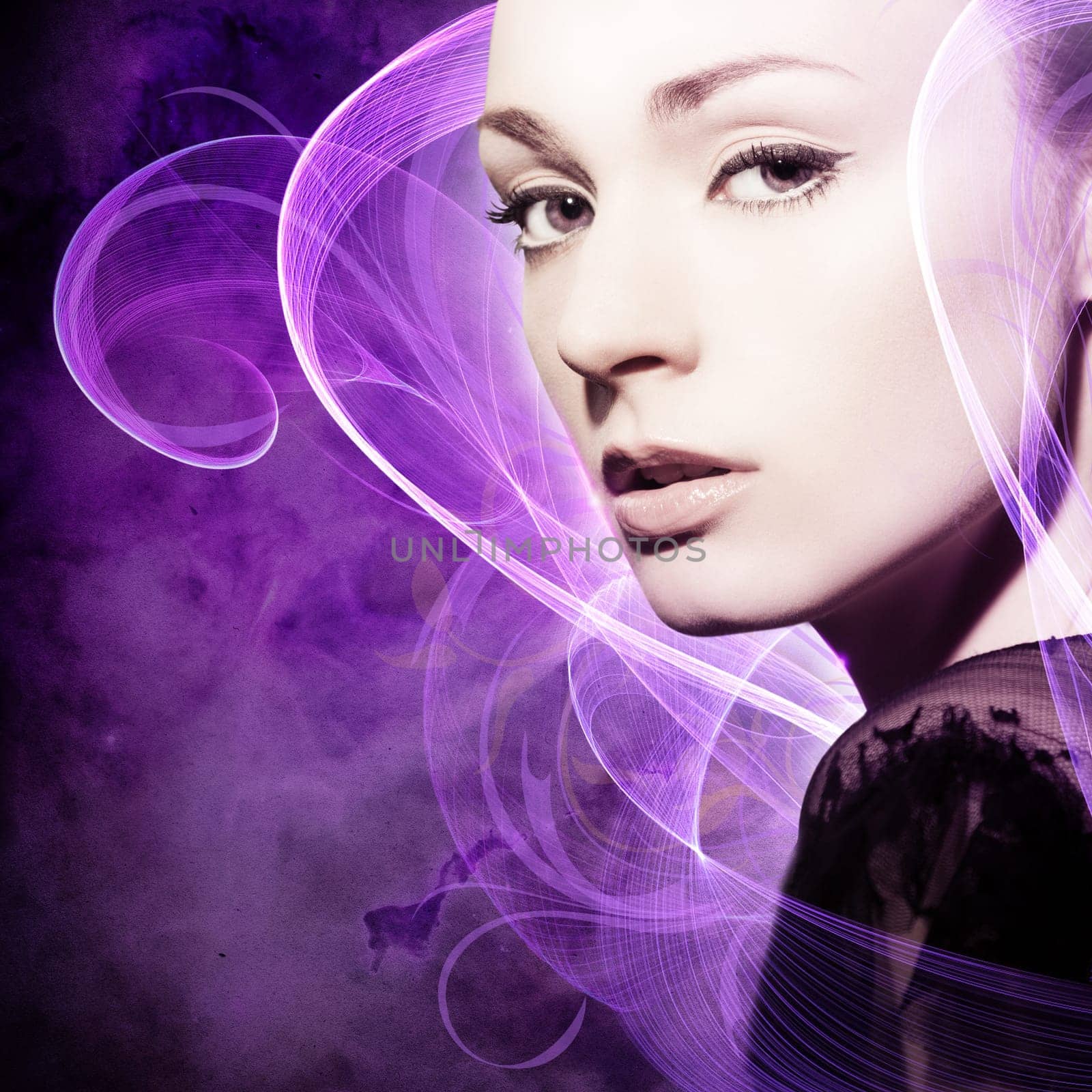 Beautiful,young woman with threads of light in the background