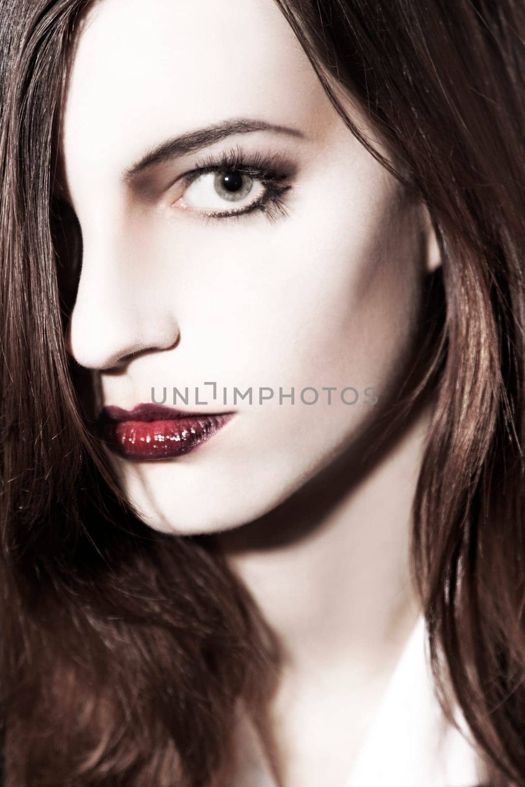 Beautiful young woman looking at camera