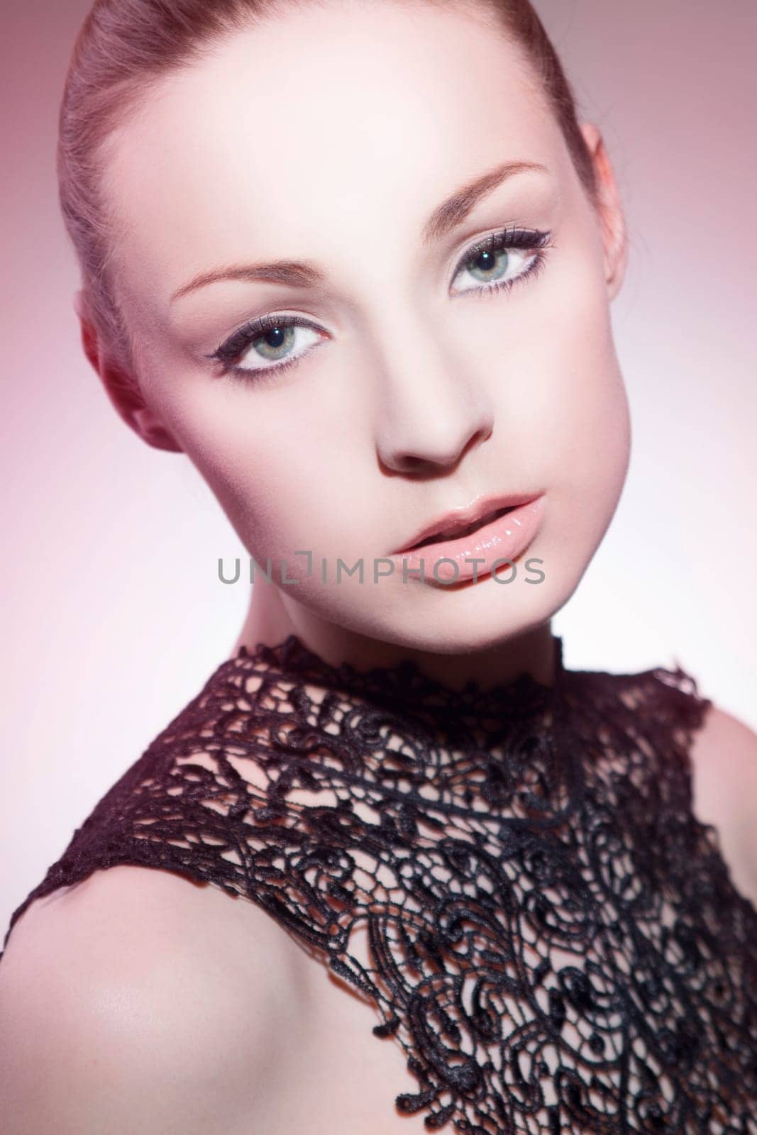 Beautiful young woman with evening dress and perfect makeup