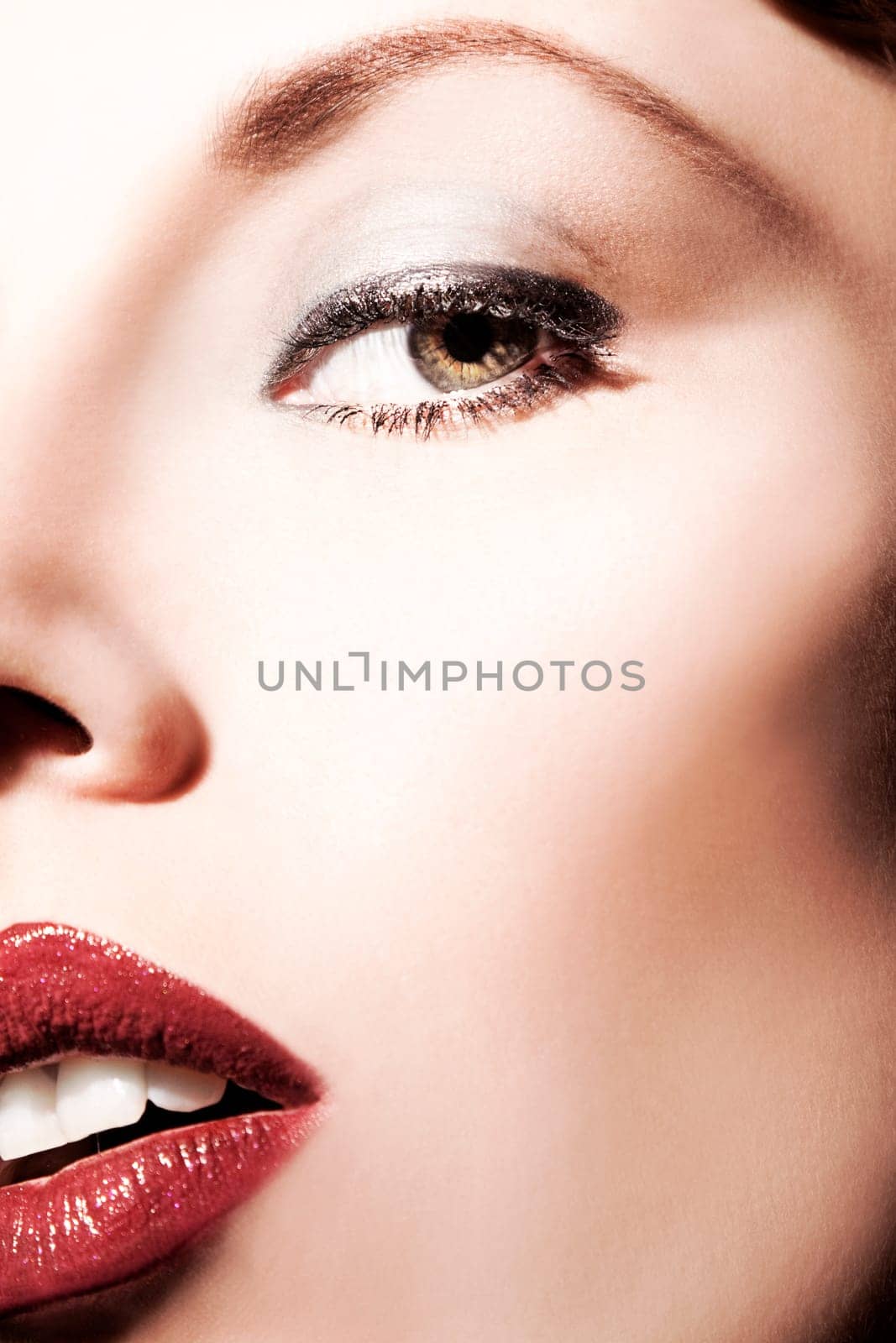 Face of a beautiful,young woman with perfect,modern make-up