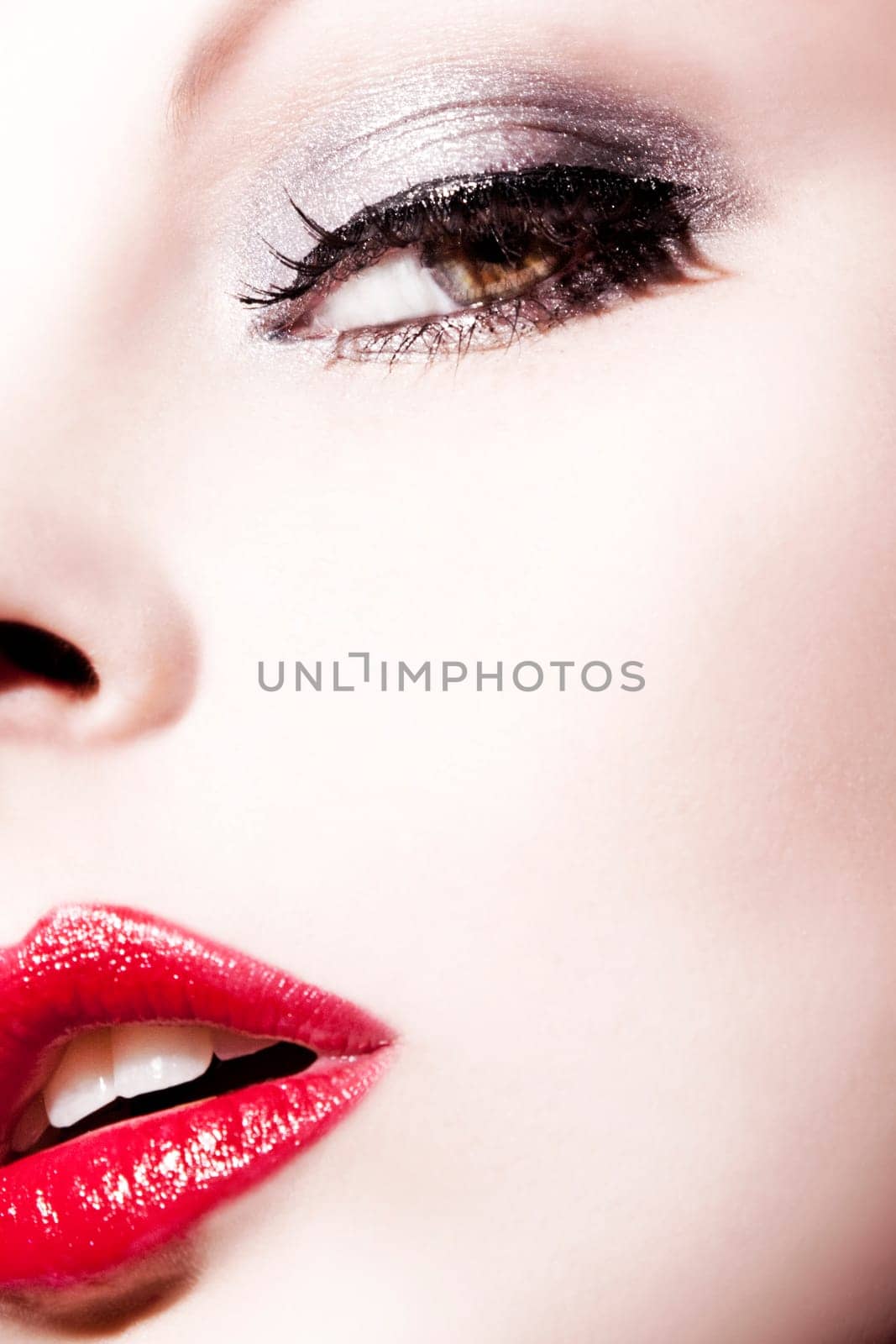 Face of a beautiful,young woman with perfect,modern make-up