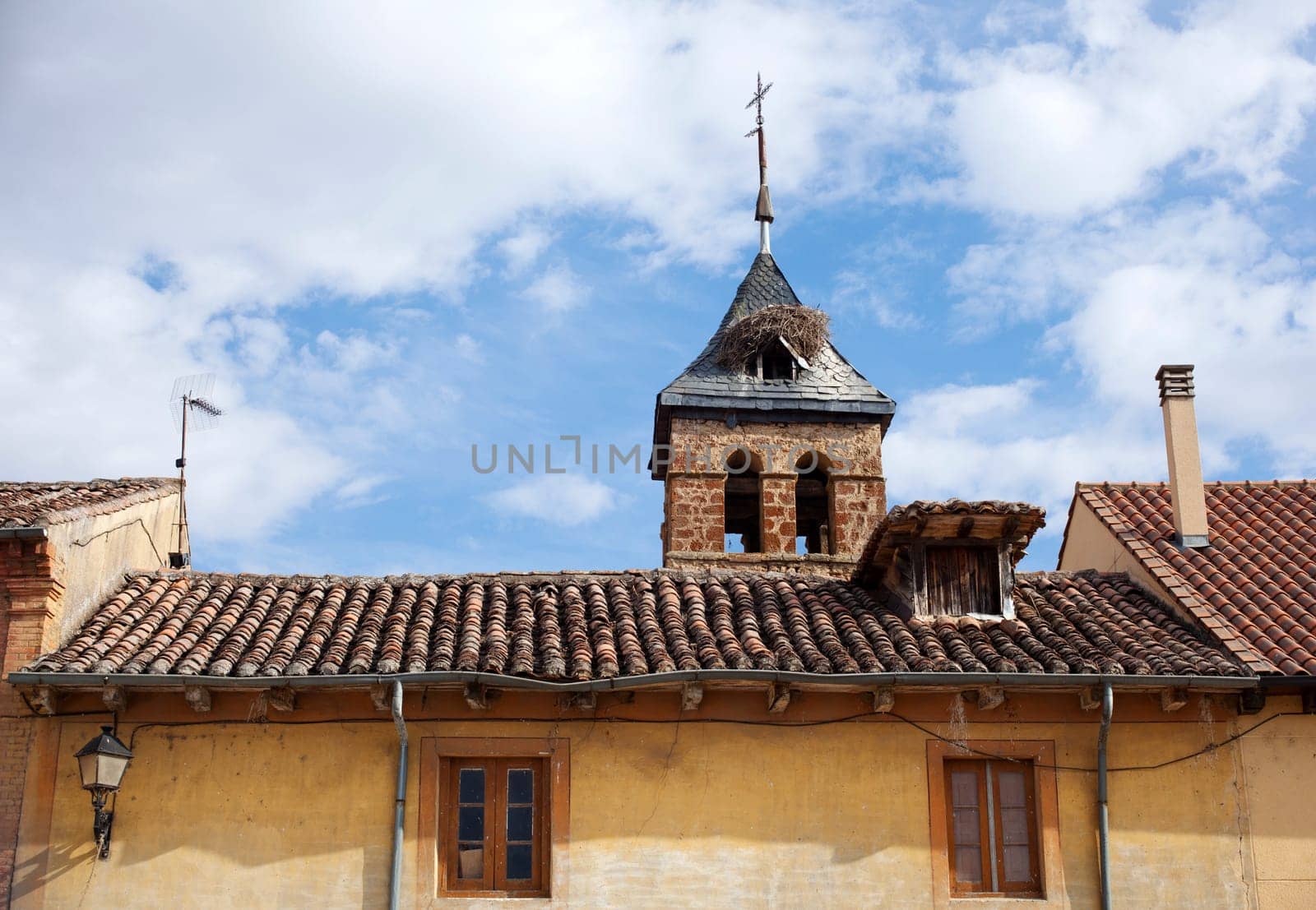 Nest stork on the bell tower church