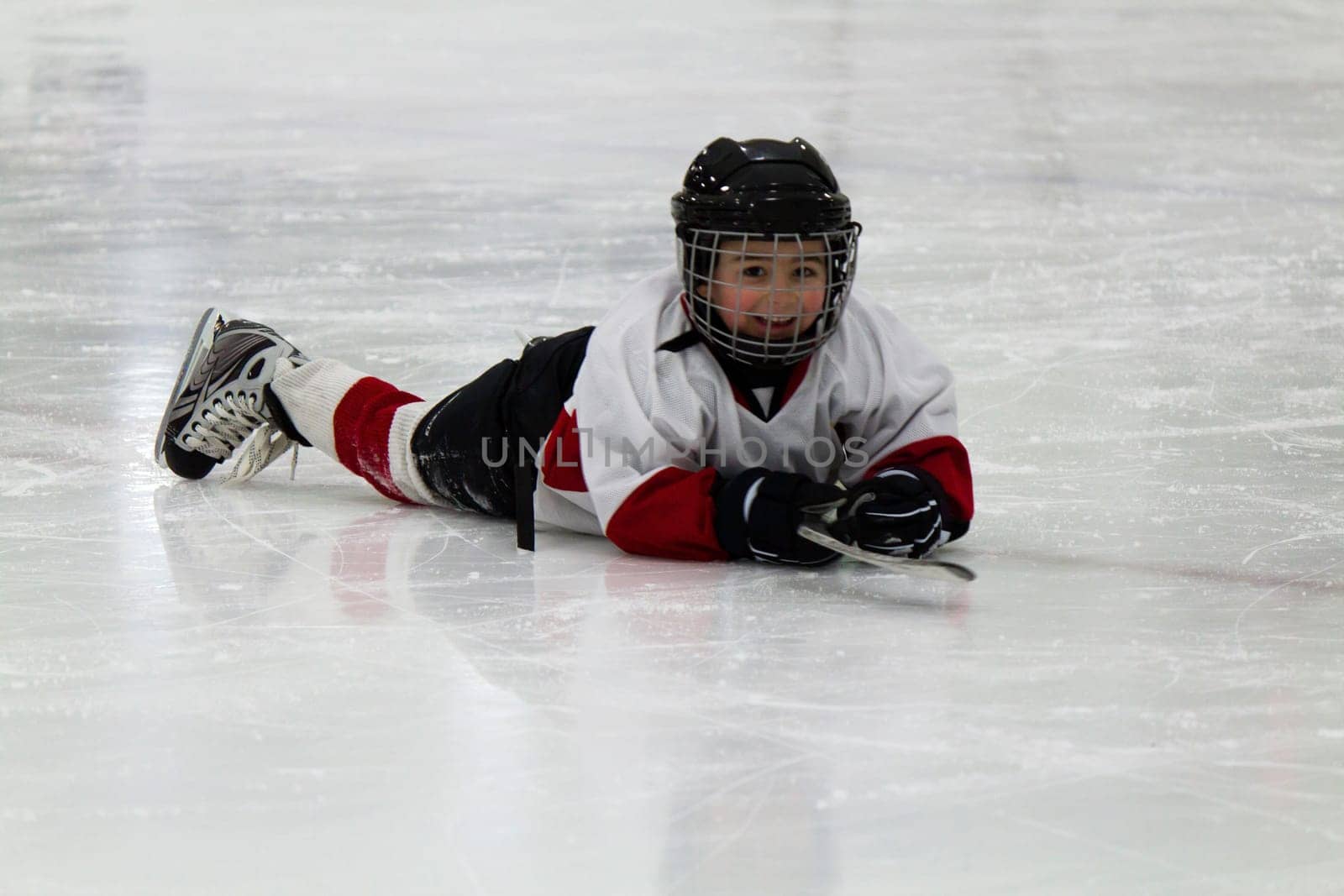 Child playing ice hockey