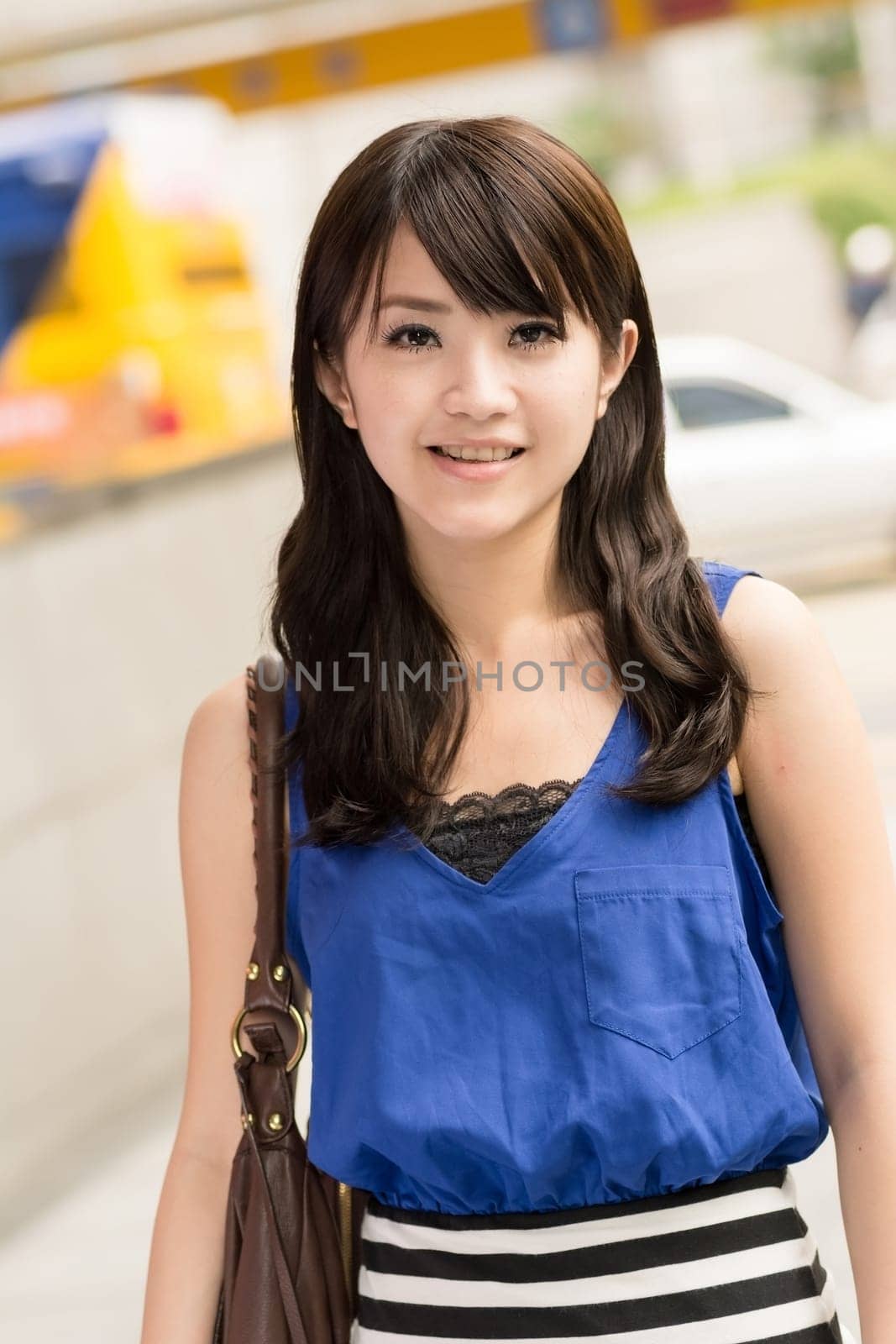 Asian beauty in daytime in modern street in Taipei, Taiwan, Asia.