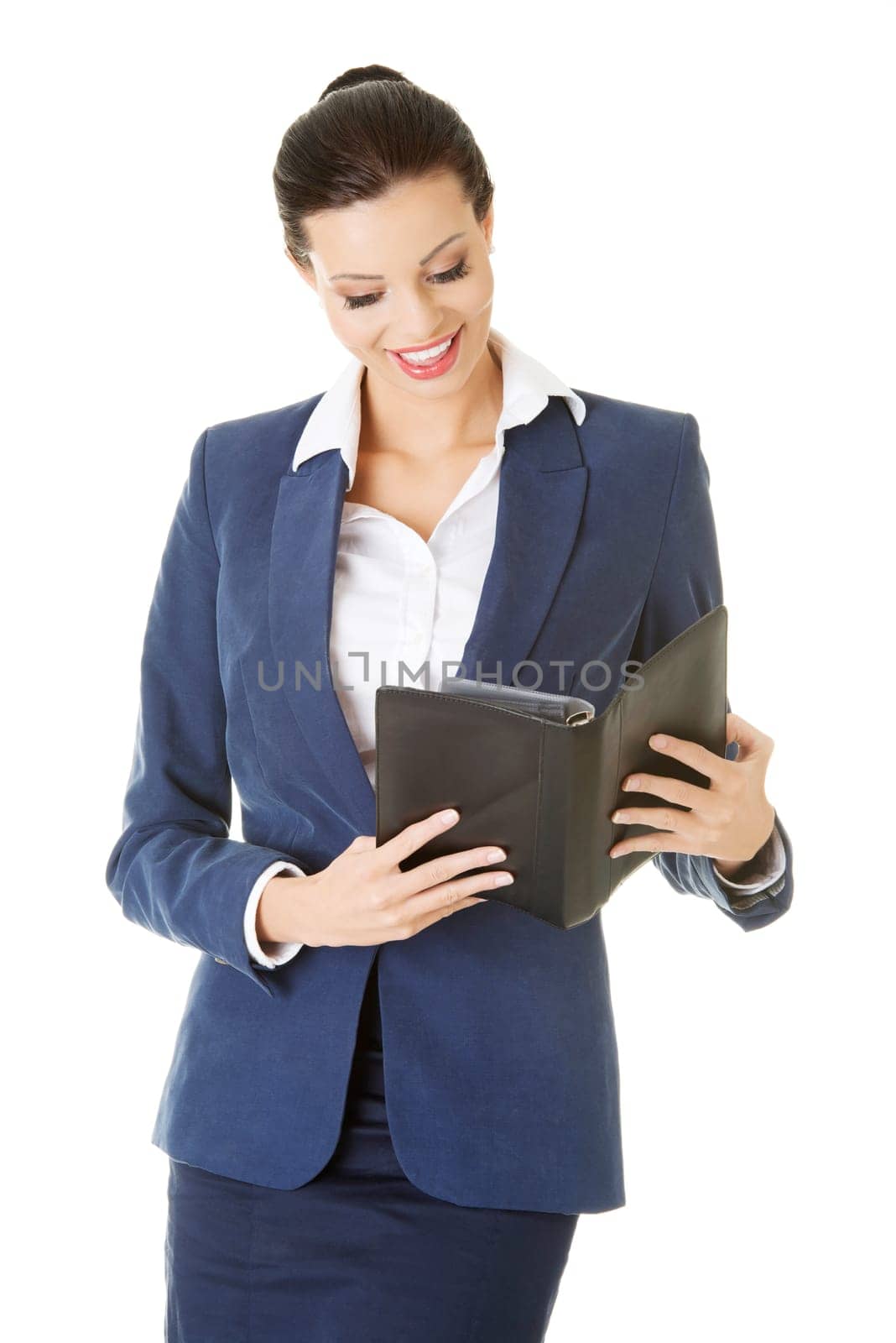 Attractive happy businesswoman, isolated on white