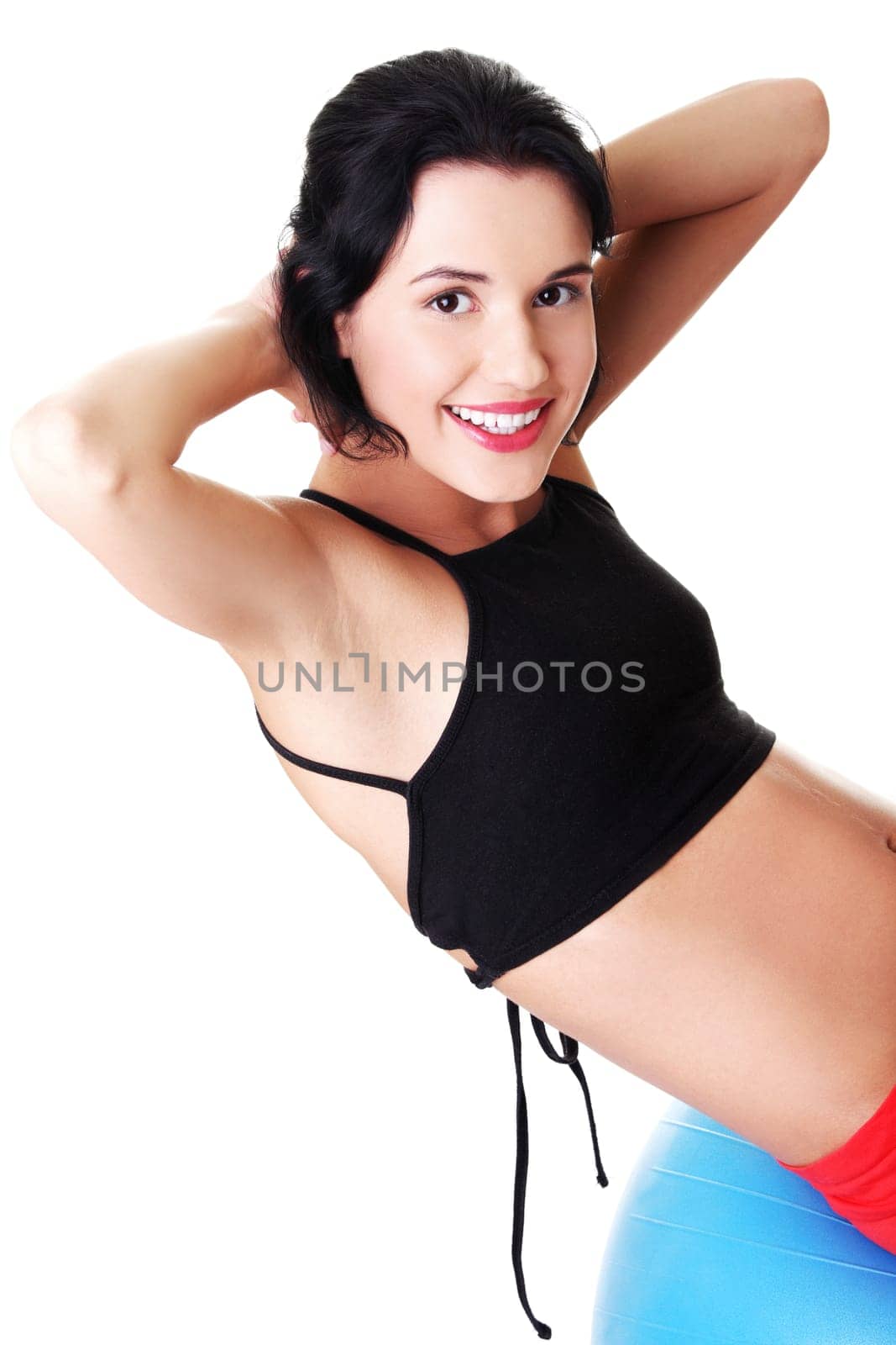Beautiful young healthy lifestyle woman with pilates exercise ball.