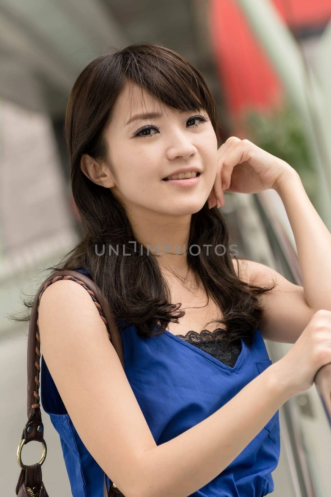 Asian beauty in daytime in modern street in Taipei, Taiwan, Asia.