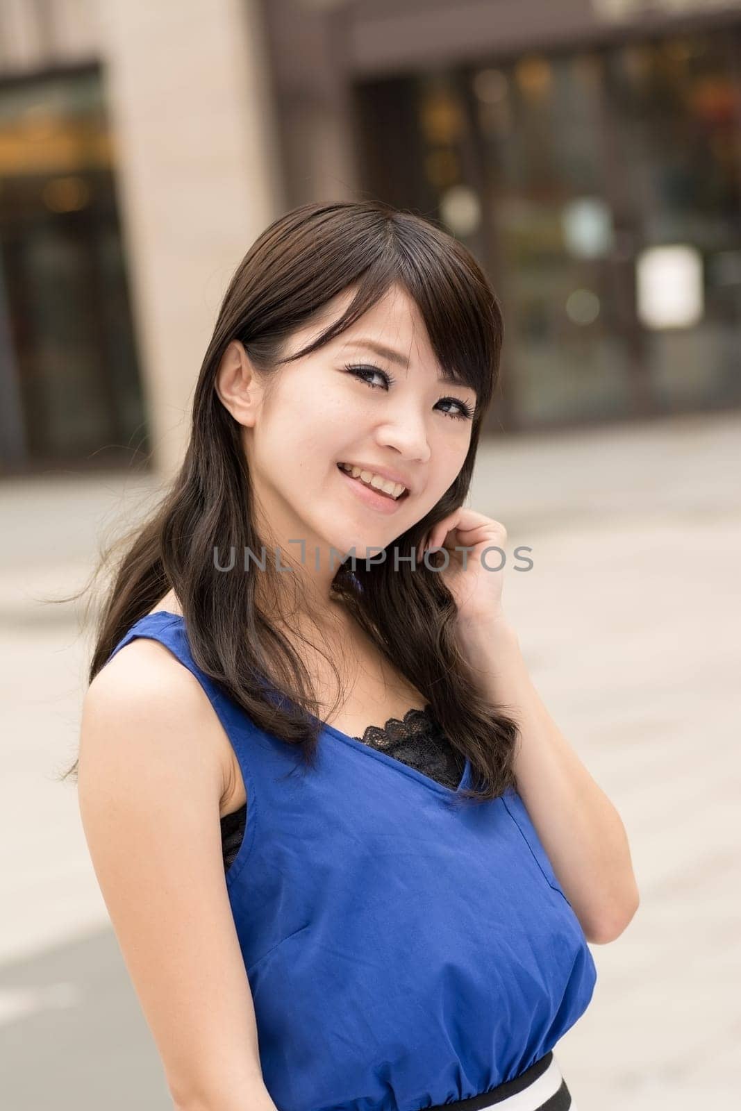 Asian beauty in daytime in modern street in Taipei, Taiwan, Asia.