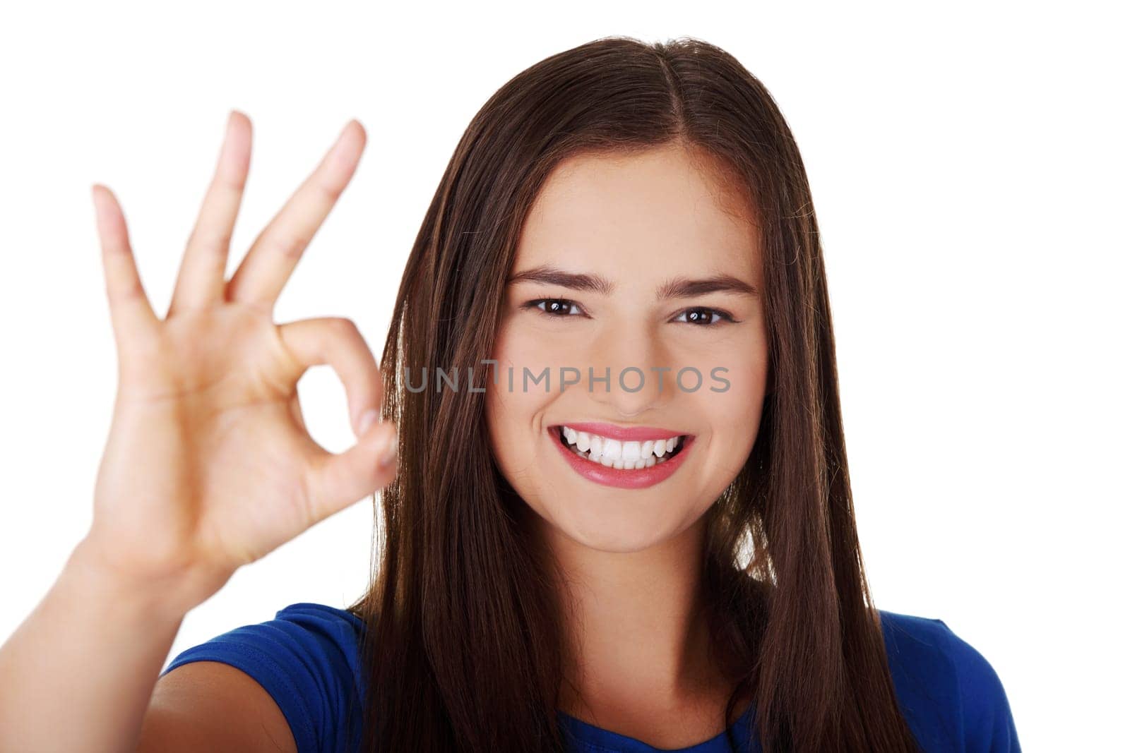 Happy teen girl gesturing perfect, isolated on white