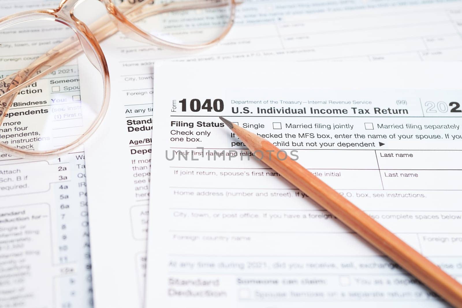 Tax form 1040 U.S. Individual Income Tax Return, business finance concept. by sweettomato
