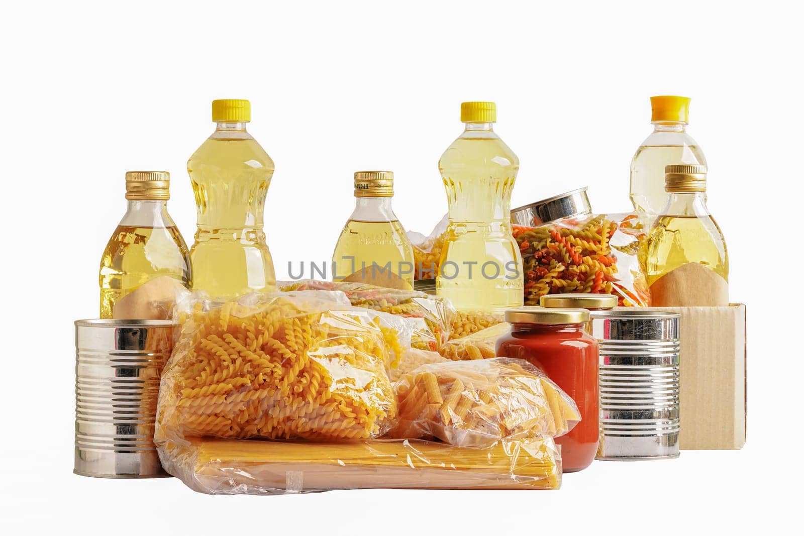 Foodstuffs in donation box isolated on white background for volunteer to help people.