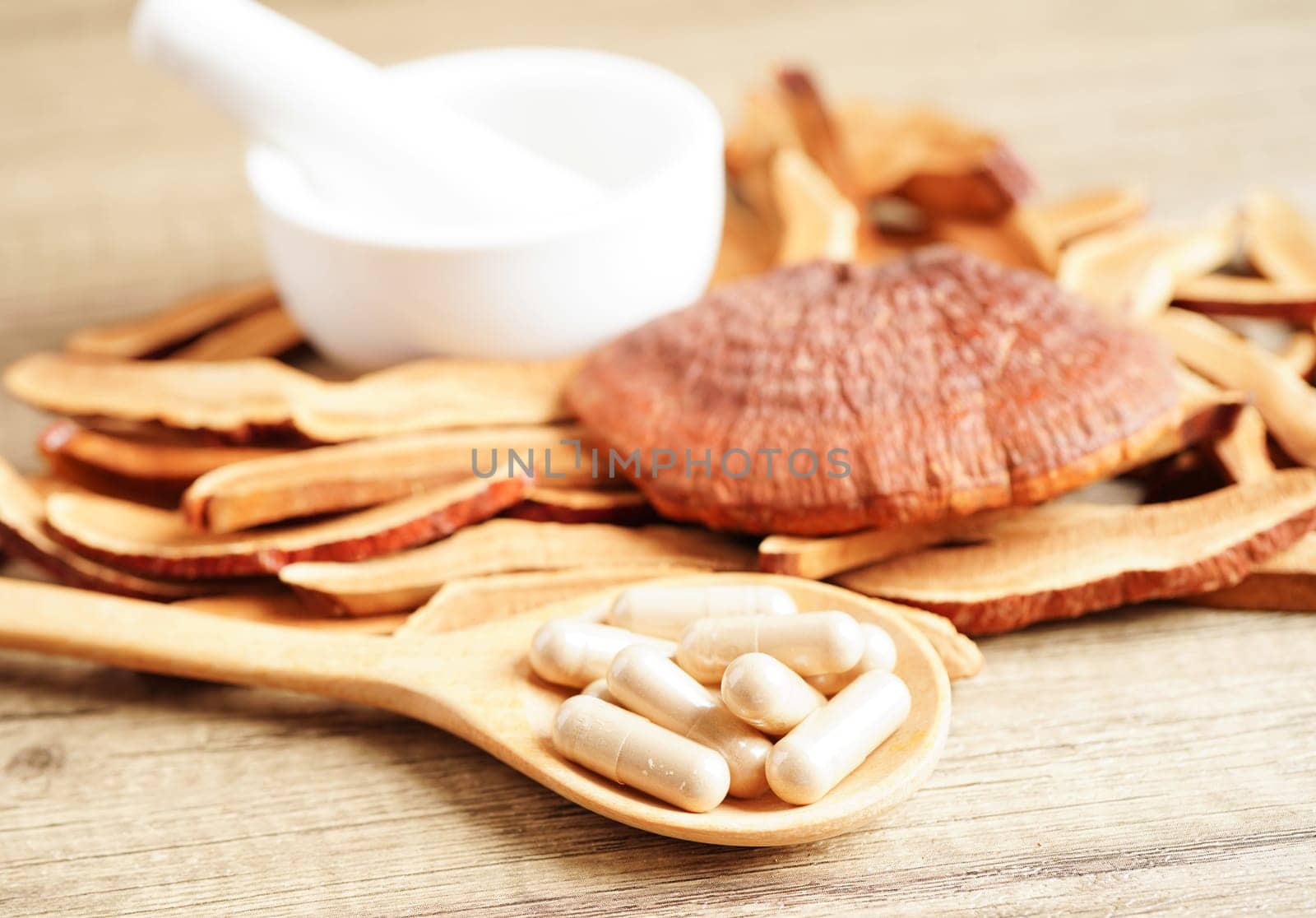 Lingzhi or Reishi mushroom with capsules, organic natural healthy food.