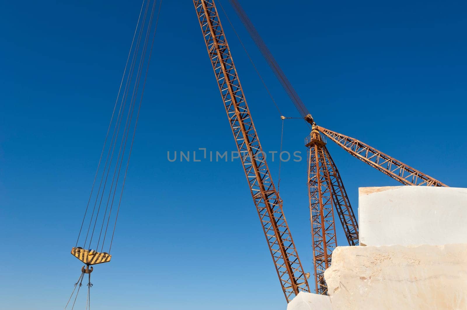Detail of a crane lifting marble blocks in a quarry, Alentejo, Portugal