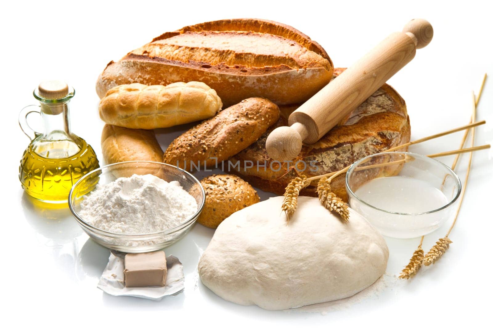 ingredients for homemade bread on white background