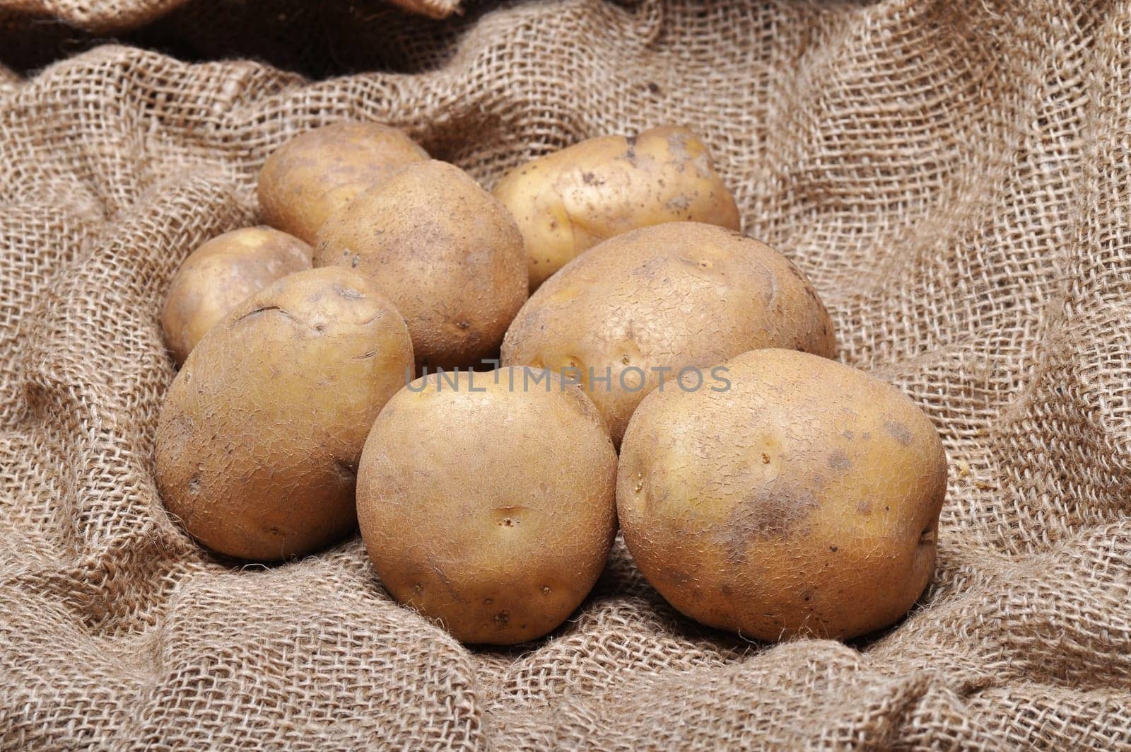 potatoes on burlap sack