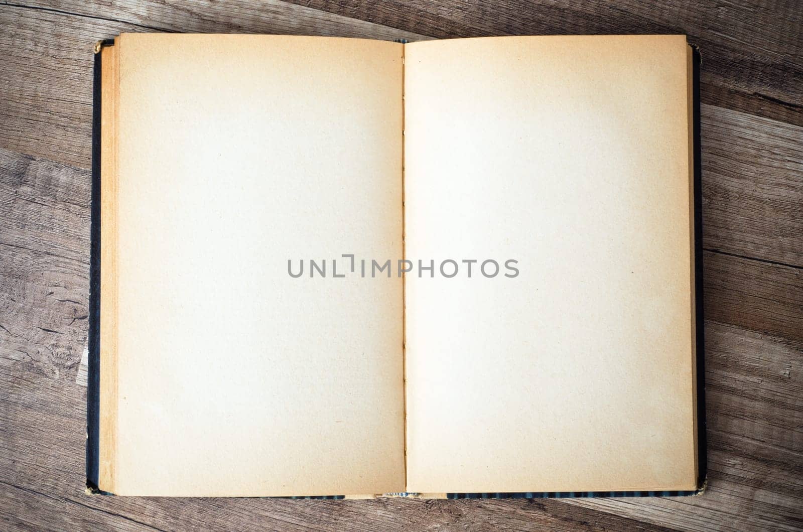 open old book on a wooden surface