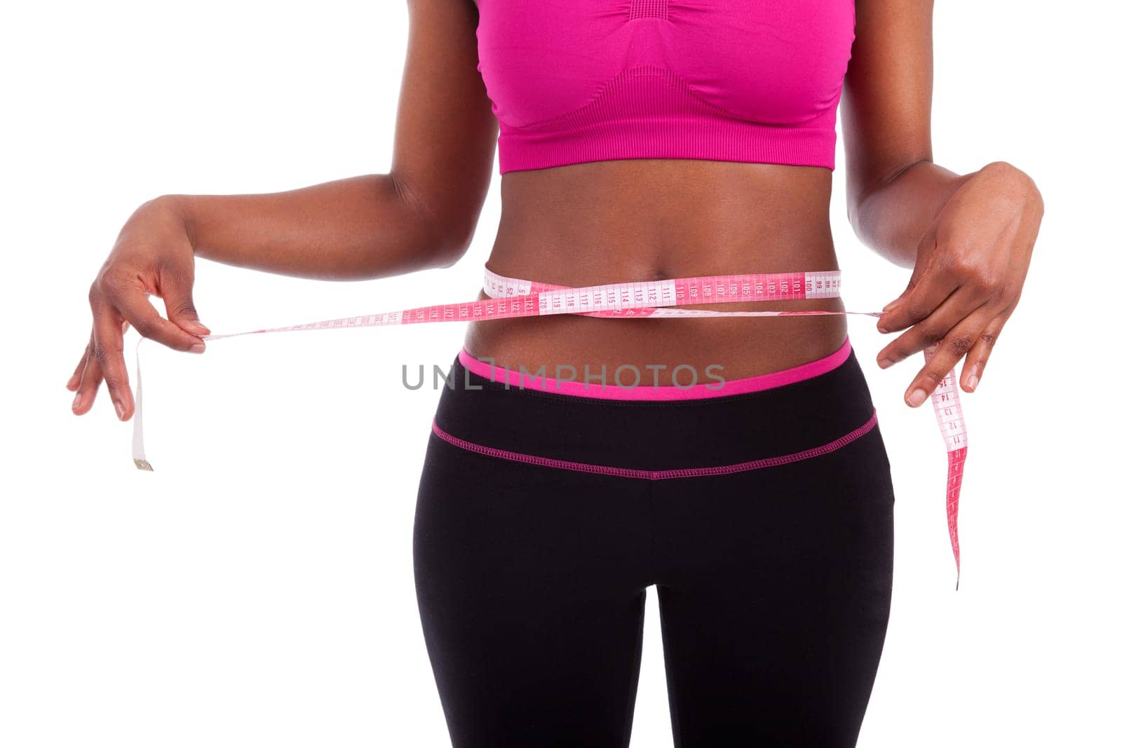 African American Fitness woman measuring her belly, isolated on white background