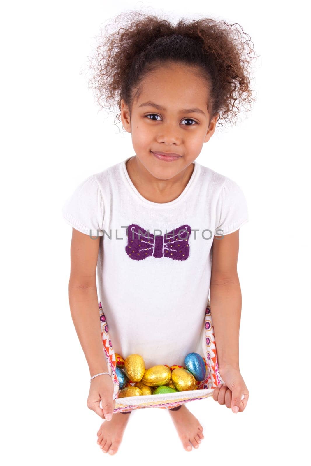 African Asian girl holding chocolate ester egg, isolated on white background