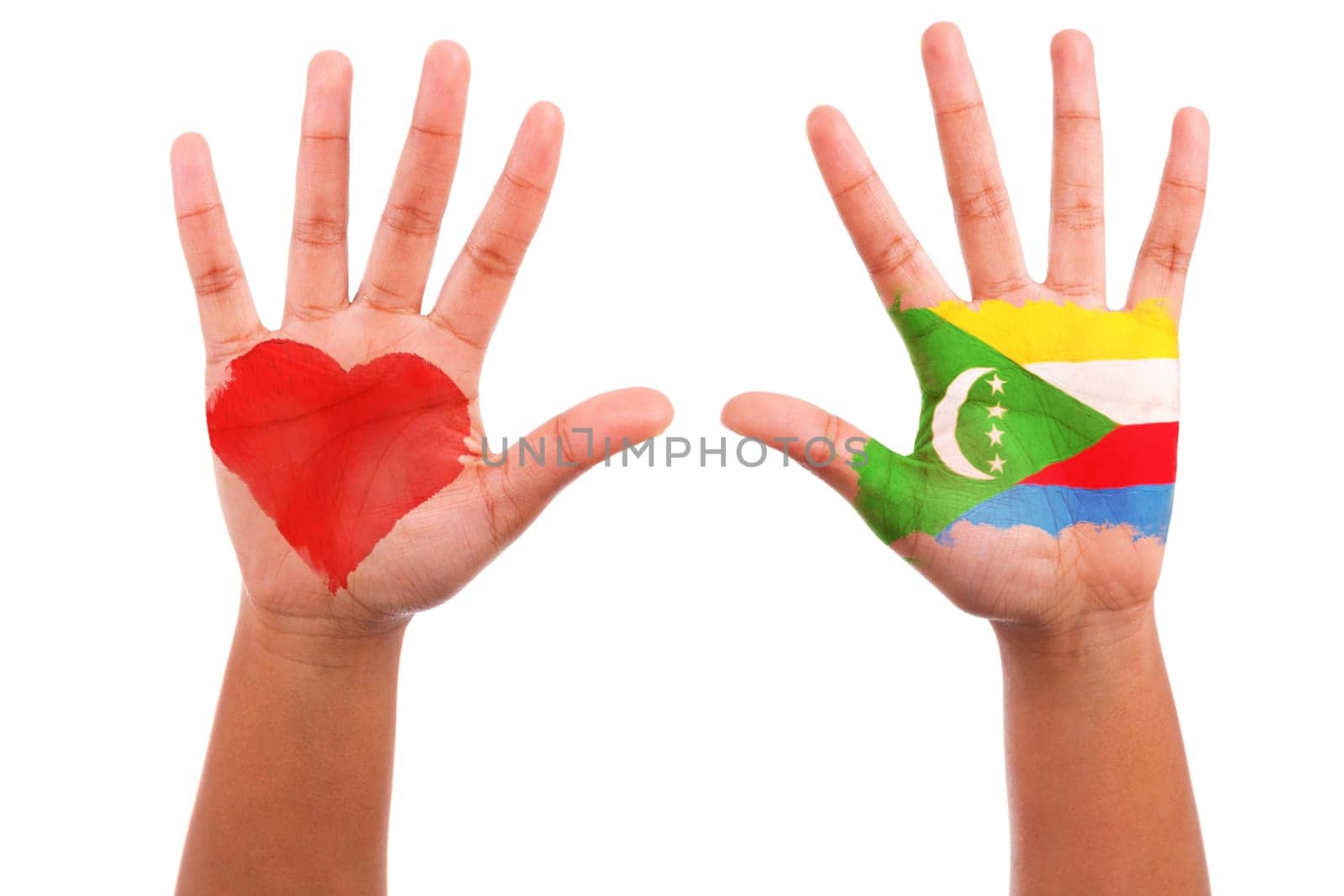 African hands with a painted heart and comorian flag, i love comoros concept, isolated on white background