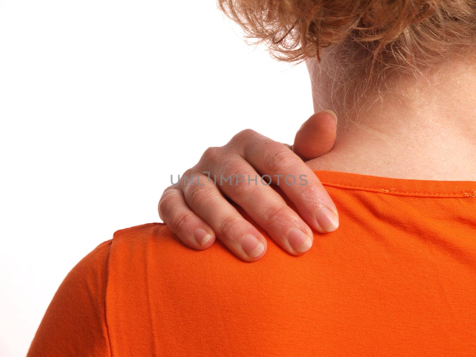Woman holding her back