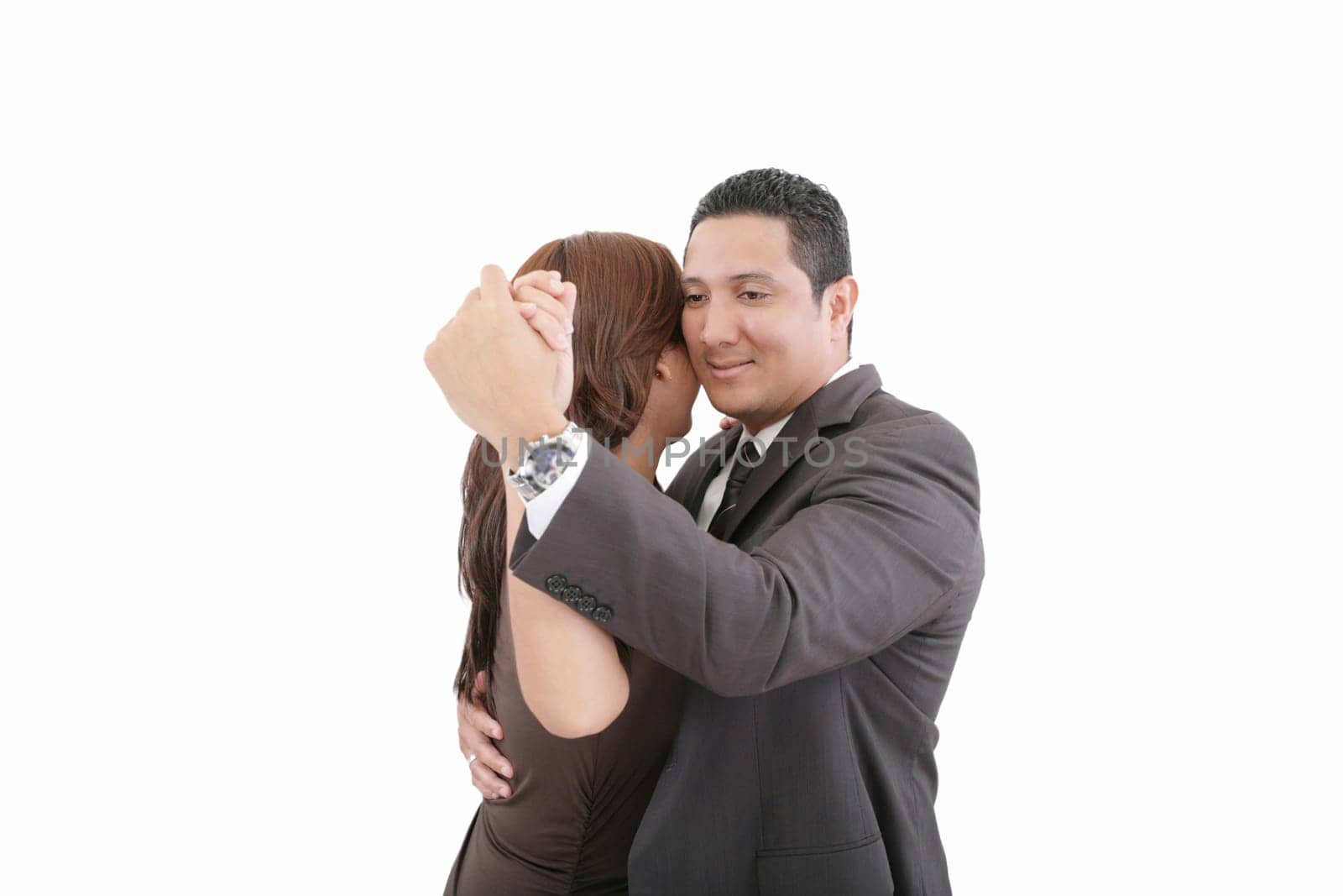 young couple dancing over white background