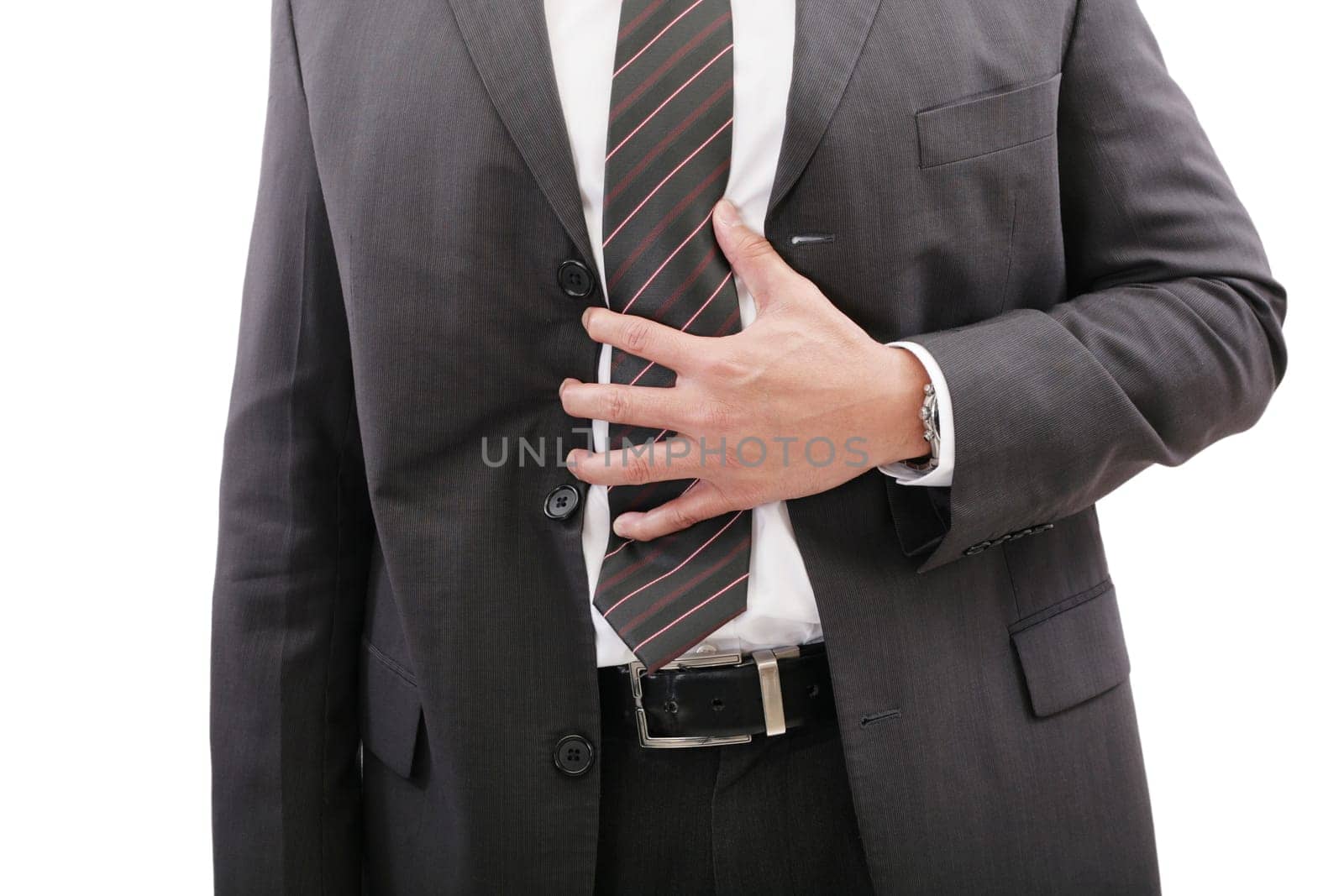 Businessman holding his stomach in pain or indigestion