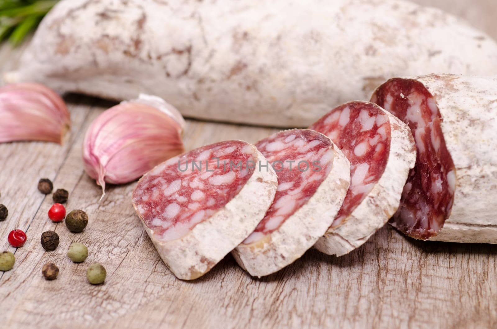 Three slices of Italian salami sausage