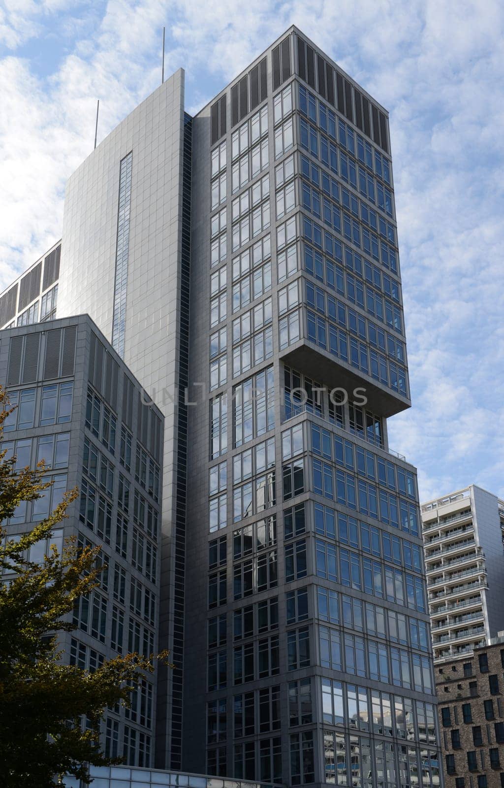 Modern building detail in Berlin (Germany) with blue sky background.