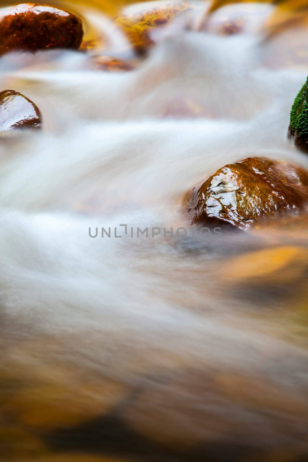 Fast flowing water in the mountain river for adv or others purpose use