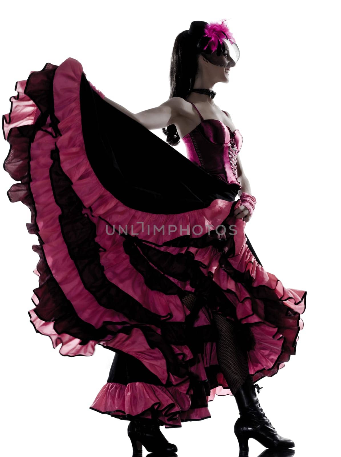 woman dancer dancing french cancan in studio isolated on white background