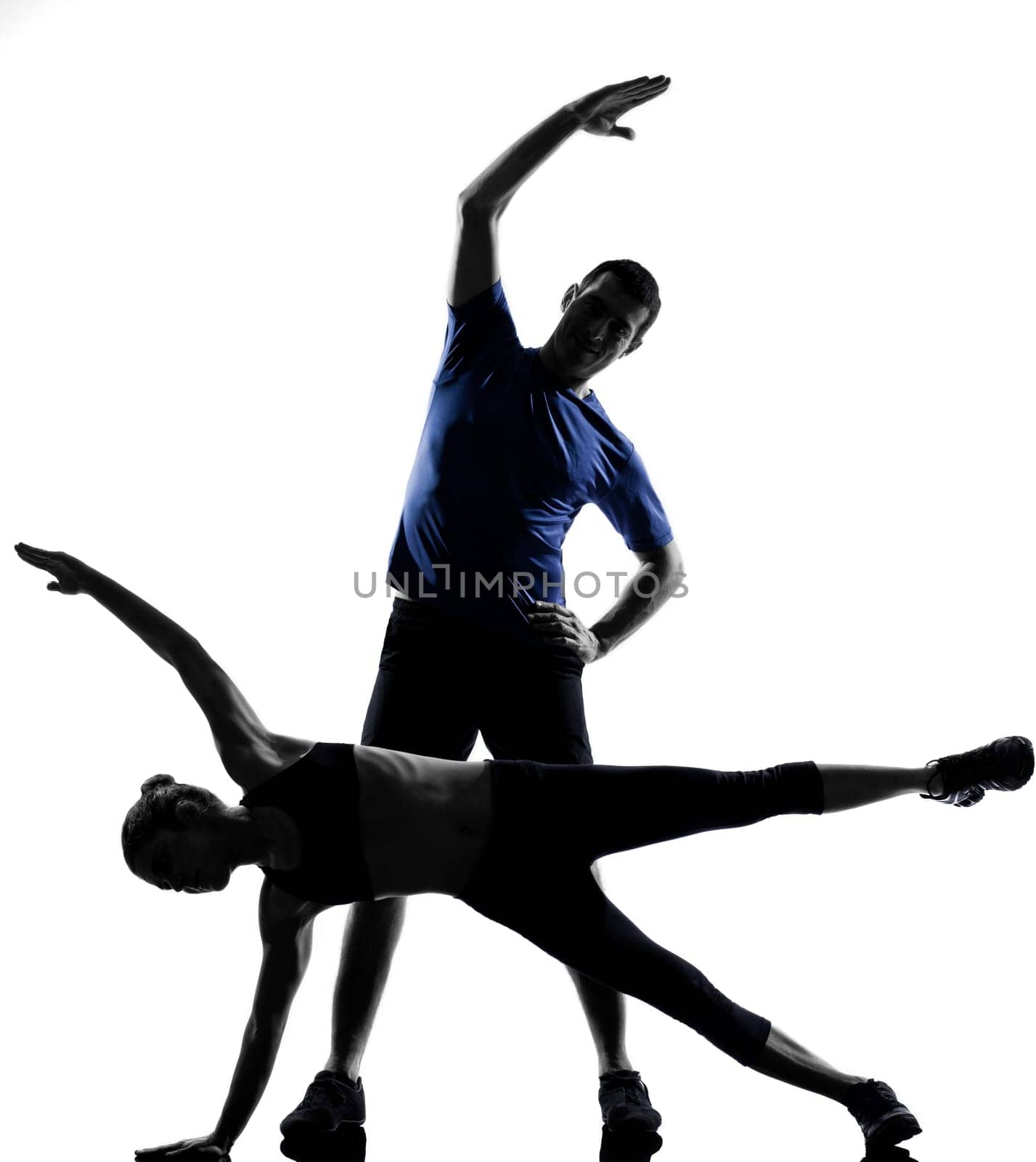 couple woman man exercising workout fitness aerobics posture in silhouette studio isolated on white background