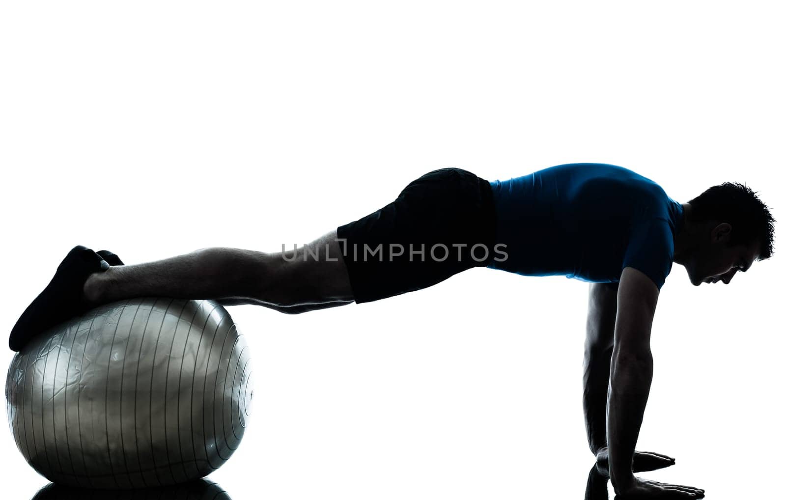 one caucasian man exercising workout fitness ball in silhouette studio  isolated on white background