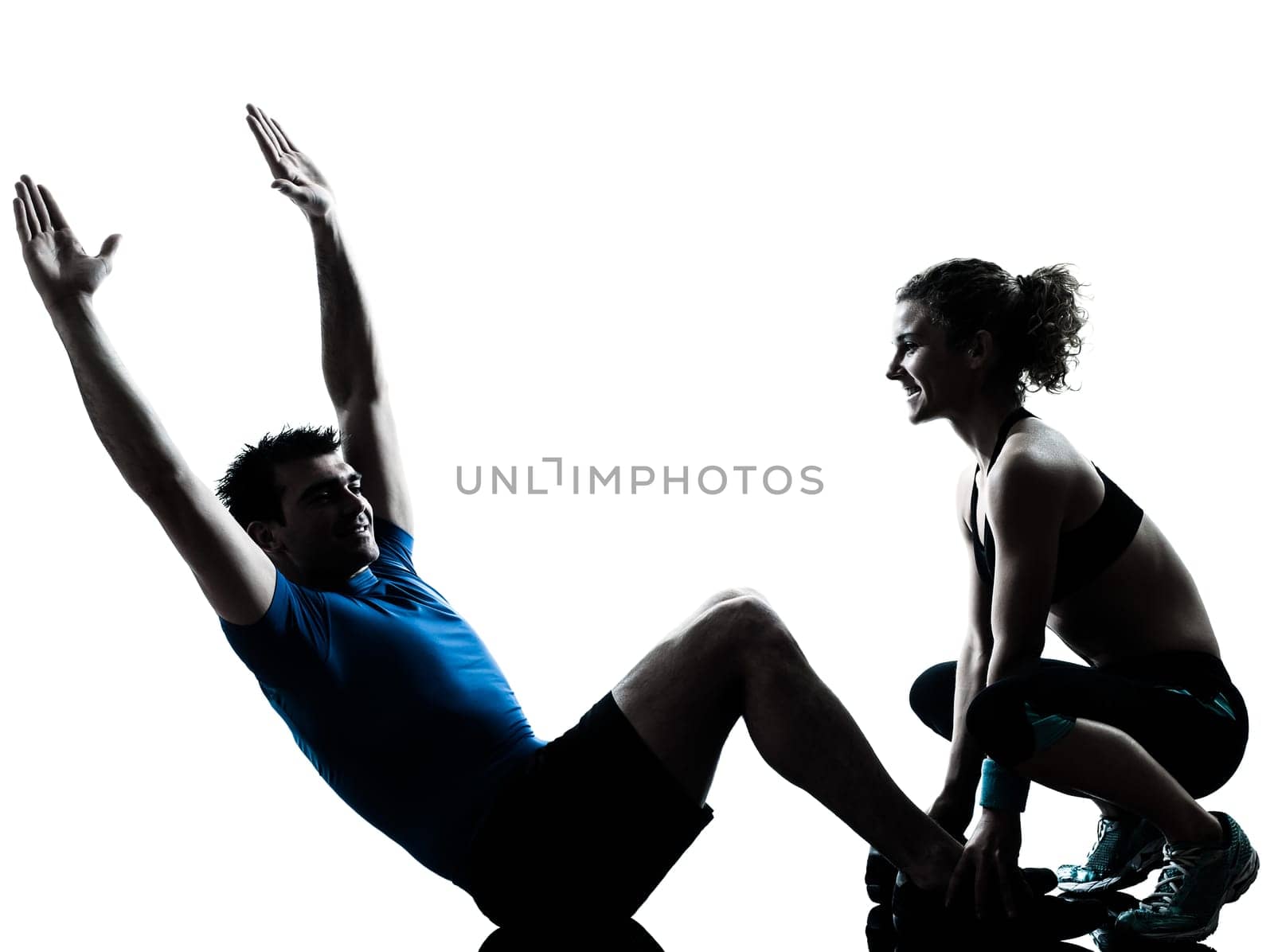 one caucasian couple man woman personal trainer coach exercising abdominal silhouette studio isolated on white background