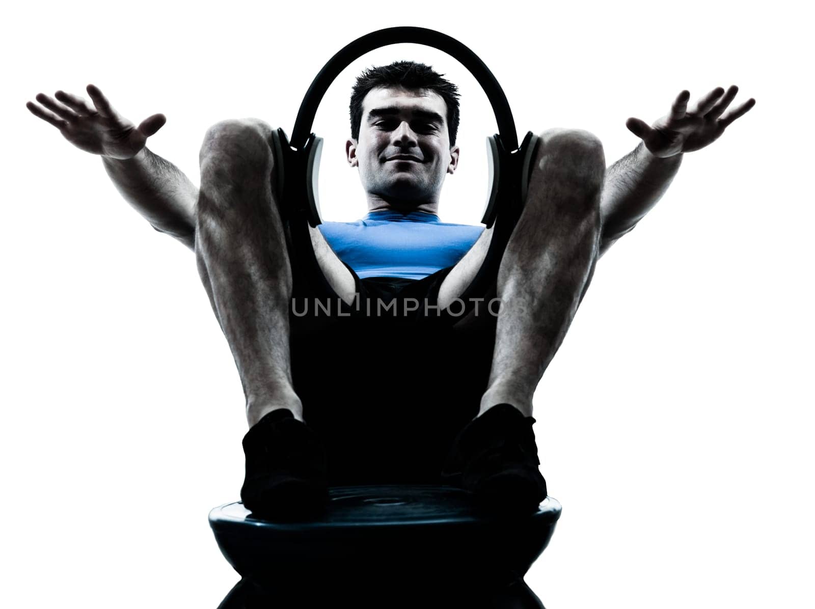 one caucasian man exercising pilates ring bosu workout fitness in silhouette studio  isolated on white background