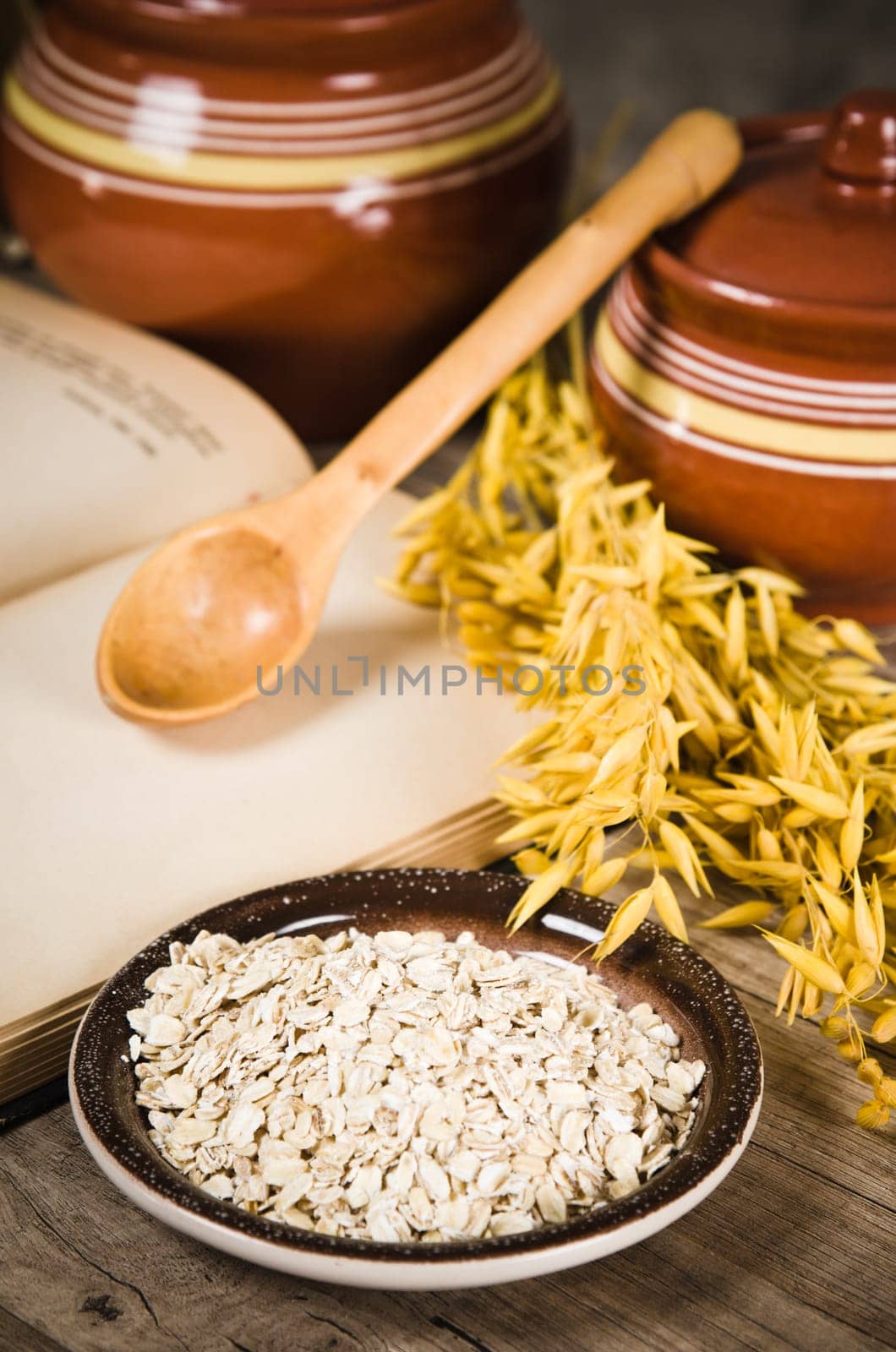 Still life with oatmeal and an open book